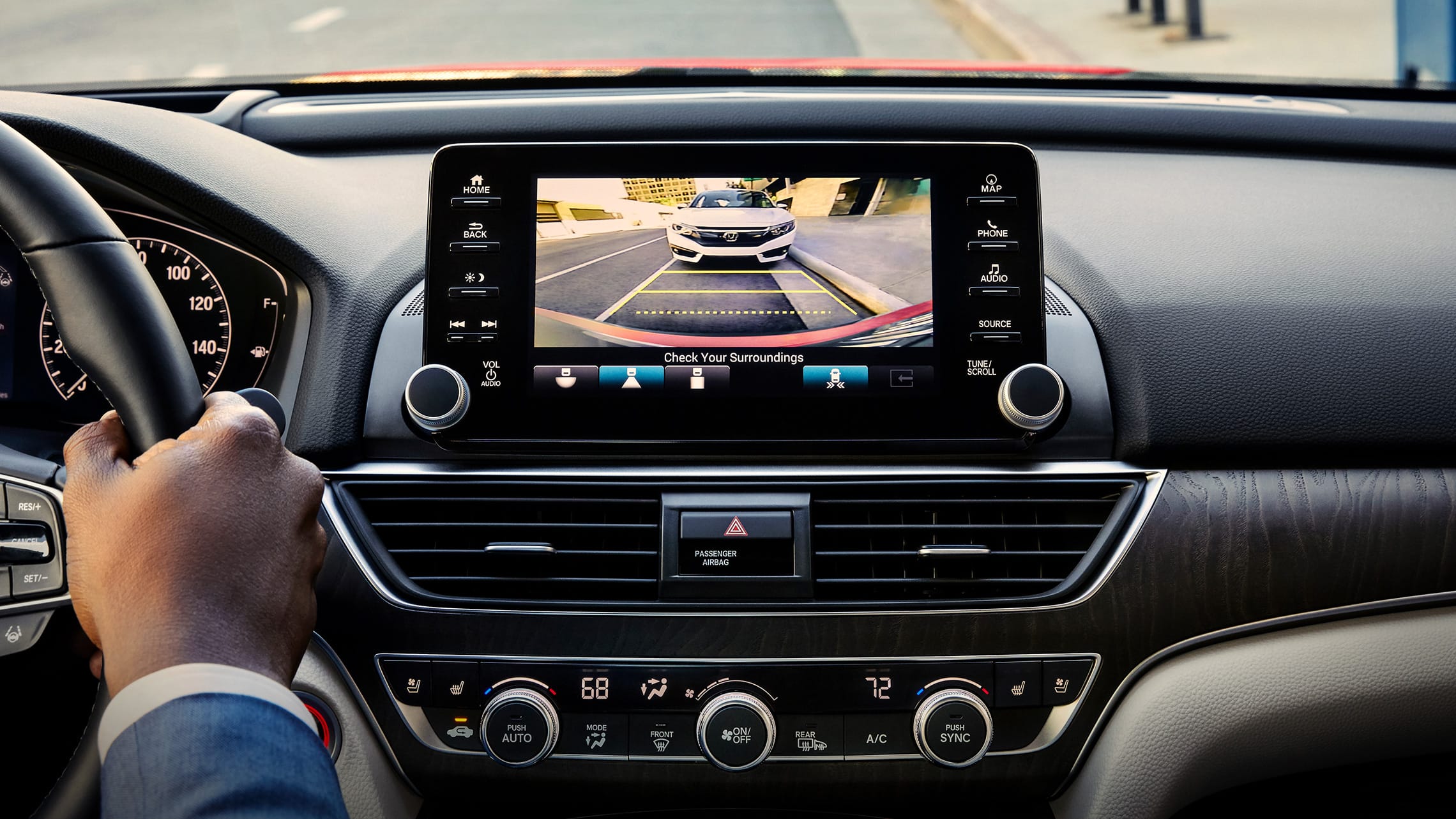 Detail of the Accord Display Audio touch-screen demonstrating the functionality of the Low-Speed Braking Control feature.