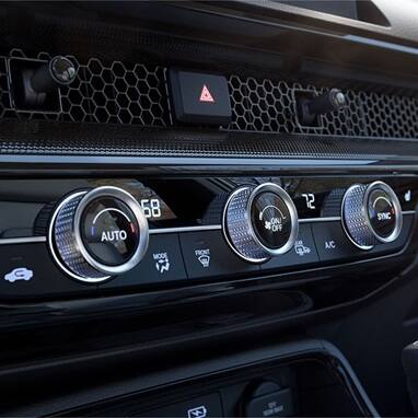 2027 Honda CR-V climate control knobs and honeycomb dashboard vents (Compact Crossover SUV).