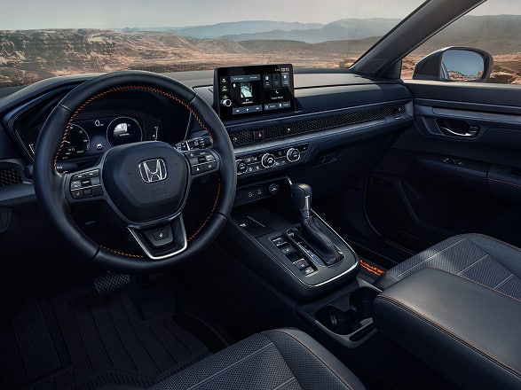 2027 Honda CR-V dashboard and steering wheel with orange stitching (Compact Crossover SUV).
